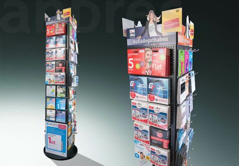 Rotating floor sales stand with perforated wall hooks for arranging products and exchangeable magnetic screens as a topper.